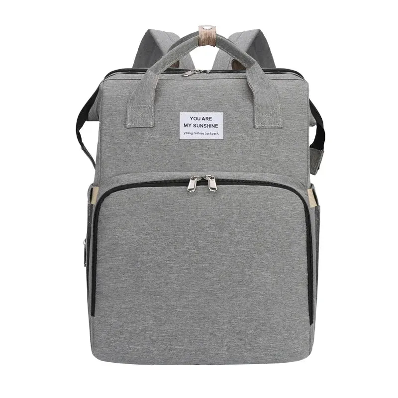 A 3-in-1 foldable baby crib diaper multi-function mummy backpack